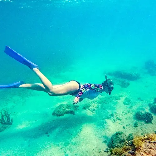 Woman Snorkeling on British Virgin Isles All-Inclusive Sailing Charter