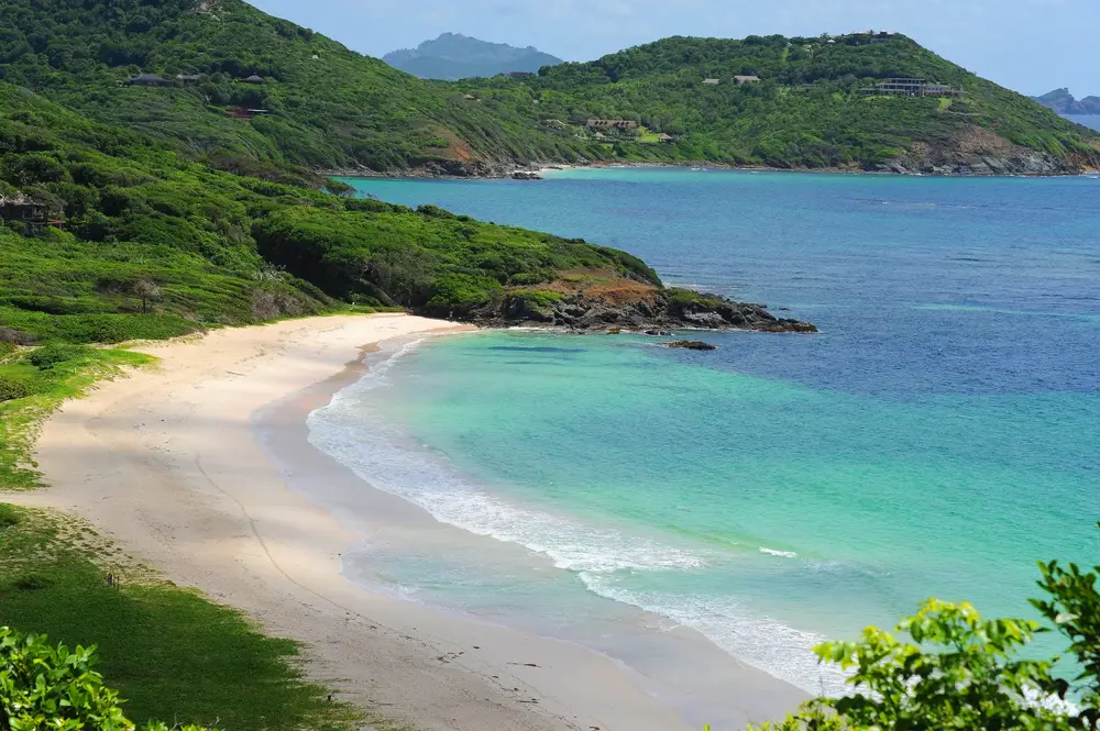 Beautiful white sand beaches of Mustique Island in St. Vincent and the Grenadines